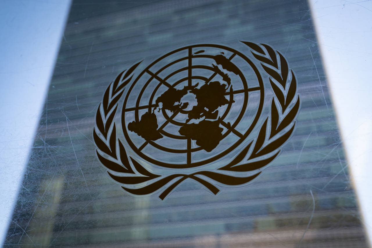 FILE - The symbol of the United Nations is displayed outside the Secretariat Building during an eme...