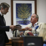 
              Andino Reynal, lawyer for Alex Jones, questions Neil Heslin, father of 6-year-old Sandy Hook shooting victim Jesse Lewis, about his previous testimony in court Tuesday Aug. 2, 2022, at the Travis County Courthouse in Austin. Jones has been found to have defamed the parents of a Sandy Hook student for calling the attack a hoax.  (Briana Sanchez/Austin American-Statesman via AP, Pool)
            