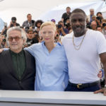 
              FILE - Director George Miller, from left, Tilda Swinton, and Idris Elba pose for photographers at the photo call for the film "Three Thousand Years of Longing" at the 75th international film festival, Cannes, southern France, on May 21, 2022. (AP Photo/Petros Giannakouris, File)
            