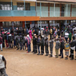 
              People line up to vote at the Gatina Primary School in Nairobi, Kenya, Tuesday, Aug. 9, 2022. Kenyans are voting Tuesday in an unusual presidential election, where a longtime opposition leader who is backed by the outgoing president faces the brash deputy president who styles himself as the outsider and a “hustler.” (AP Photo/Khalil Senosi)
            
