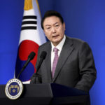 
              South Korean President Yoon Suk Yeol delivers a speech during a news conference to mark his first 100 days in office at the presidential office in Seoul, South Korea, Wednesday, Aug. 17, 2022. Yoon said Wednesday his government has no plans to pursue its own nuclear deterrent in the face of growing North Korean nuclear threats, as he urged the North to return to dialogue aimed at exchanging denuclearization steps for economic benefits. (Chung Sung-Jun/Pool Photo via AP)
            