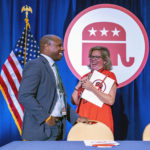 
              Milwaukee Mayor Cavalier Johnson, left, speaks with Cam Henderson, right, from the Republican National Committee, at the JW Marriott in Chicago ahead of Milwaukee's expected selection to host the 2024 Republican National Convention, Friday, Aug. 5, 2022. (Jovanny Hernandez/Milwaukee Journal-Sentinel via AP)
            