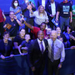 
              President Joe Biden poses for a photo with Maryland Democratic gubernatorial candidate Wes Moore after speaking at a rally hosted by the Democratic National Committee at Richard Montgomery High School, Thursday, Aug. 25, 2022, in Rockville, Md. (AP Photo/Evan Vucci)
            