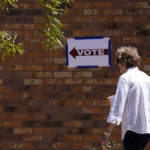 
              A voter heads into a polling stating as Arizona voters go the polls to cast their ballots, Tuesday, Aug. 2, 2022, in Tempe, Ariz. (AP Photo/Ross D. Franklin)
            