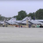 
              In this handout photo taken from video released by Russian Defense Ministry Press Service on Thursday, Aug. 18, 2022, three MiG-31 fighter jets of the Russian air force stand after lending at the Chkalovsk air base in the Kaliningrad region. The Russian Defense Ministry said three MiG-31 fighters equipped to carry Kinzhal hypersonic missiles were deployed to the region as part of "additional measures of strategic deterrence." (Russian Defense Ministry Press Service photo via AP)
            