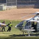 
              In this still image from video, author Salman Rushdie is taken on a stretcher to a helicopter for transport to a hospital after he was attacked during a lecture at the Chautauqua Institution in Chautauqua, N.Y., Friday, Aug. 12, 2022. (AP Photo)
            