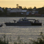 
              A navy patrol boat anchors on the Mekong river near a hotel where the 55th ASEAN Foreign Ministers' Meeting (55th AMM) is taking place in Phnom Penh, Cambodia, Tuesday, Aug. 2, 2022. Southeast Asian foreign ministers are gathering in the Cambodian capital for meetings addressing persisting violence in Myanmar and other issues, joined by top diplomats from the United States, China, Russia and other world powers amid tensions over the invasion of Ukraine and concerns over Beijing's growing ambitions in the region. (AP Photo/Heng Sinith)
            