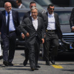 
              UN Secretary General Antonio Guterres, center, arrives to Zeyport in Istanbul, Turkey, Saturday, Aug. 20, 2022. During a visit, Guterres was briefed on the ongoing inspection of the bulk cargo ship SSI Invincible II anchored at the Marmara sea next to Istanbul. The vessel will head to Chornomorsk, Ukraine.  (AP Photo/Francisco Seco)
            