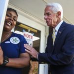 
              Poll worker Patrice Perry, a volunteer, is greeted by U.S. Rep. Charlie Crist as he enters the polls to vote in person on Election Day at Gathering Church on Tuesday, Aug. 23, 2022 in St. Petersburg, Fla. Crist is running for Florida Governor against Agriculture Commissioner Nikki Fried in the primary election.  (Dirk Shadd/Tampa Bay Times via AP)
            