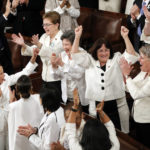 
              FILE - In this Feb. 5, 2019 file photo, women members of Congress cheer after President Donald Trump acknowledges more women in Congress during his State of the Union address to a joint session of Congress on Capitol Hill in Washington. (AP Photo/J. Scott Applewhite, File)
            