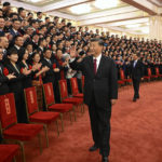 
              In this photo released by Xinhua News Agency, Chinese President Xi Jinping, center, and his premier Li Keqiang, center right, meet with representatives of model civil servants during a national award ceremony held at the Great Hall of the People in Beijing, Tuesday, Aug. 30, 2022. China's long-ruling Communist Party set October 16 for its 20th party congress, at which leader Xi is expected to be given a third five-year term. (Li Xueren/Xinhua via AP)
            