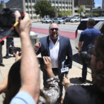 
              Alex Jones arrives at the Travis County Courthouse in Austin, Tuesday Aug. 2, 2022. The father of a 6-year-old killed in the Sandy Hook Elementary School shooting has testified that conspiracy theorist Alex Jones made his life a “living hell” by pushing claims the murders were a hoax. Neil Heslin testified Tuesday that he fears for his life because of Jones' claims. Heslin and Scarlett Lewis are the parents of 6-year-old Jesse Lewis. (Briana Sanchez/Austin American-Statesman via AP)
            