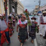 
              Indigenous community leaders join students and small farmers in a protest march against everything from government corruption to the high cost of living, in Guatemala City, Thursday, Aug. 11, 2022.  (AP Photo/Moises Castillo)
            