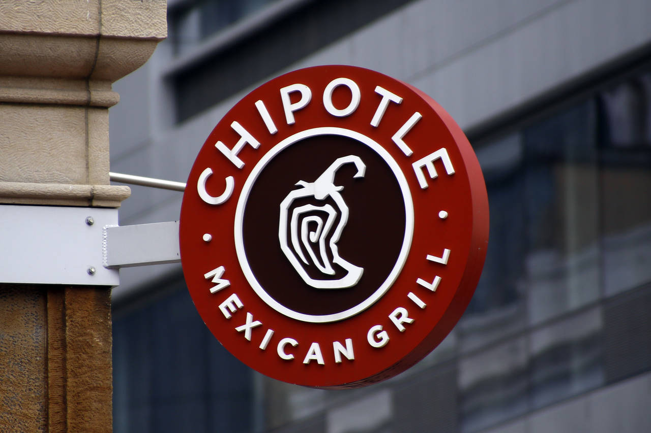 FILE - In this Feb. 8, 2016, file photo, shows a sign for the Chipotle restaurant in Pittsburgh's M...