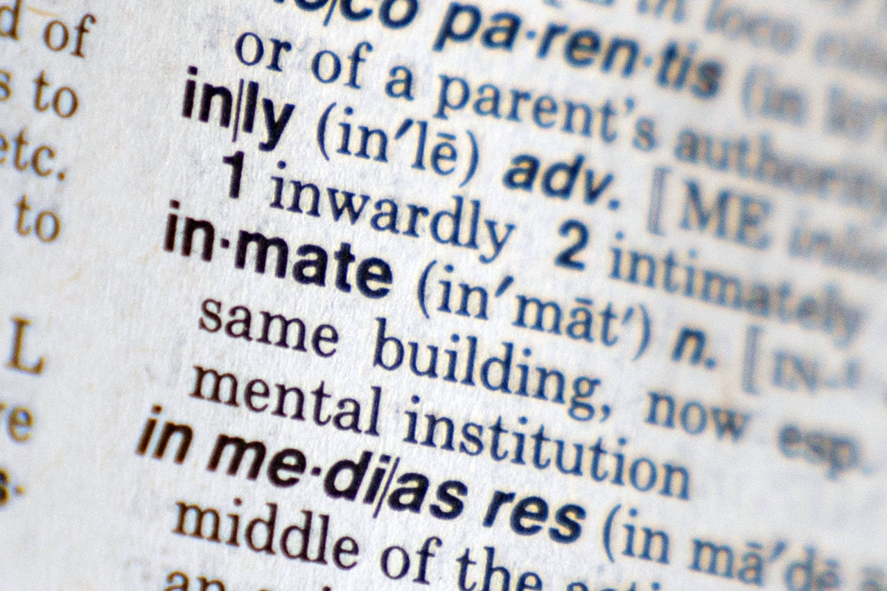 The word "inmate" appears in Webster's New World Dictionary in New York, Thursday, Aug. 11, 2022. N...