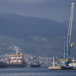 
              CORRECTS THAT THE POLARNET IS THE FIRST TO ARRIVE IN TURKEY, NOT THE FIRST TO LEAVE UKRAINE - The cargo ship Polarnet, left, arrives to Derince port in the Gulf of Izmit, Turkey, Monday Aug. 8, 2022. The Polarnet is the first Ukrainian grain shipment to arrive at its destination in Turkey under a deal to unblock grain supplies amid the threat of a global food crisis. (AP Photo/Khalil Hamra)
            