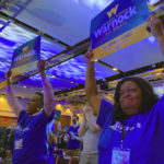 
              Delegates to the Democratic Party of Georgia's state convention cheer for U.S. Senator Raphael Warnock on Saturday, Aug. 27 in Columbus, Ga. Warnock is a Democrat seeking reelection to a full six-year term in November against opponents including Republican Herschel Walker. (AP Photo/Jeff Amy)
            