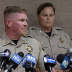 
              Nevada County Sheriff's Capt. Sam Brown answers questions as Sheriff Shannan Moon listens during a news conference in Truckee, Calif., Monday, Aug. 22, 2022, about the recovery of Kiely Rodni's vehicle. A body found in a Northern California reservoir is believed to be that of 16-year-old Kiely Rodni, who went missing weeks ago after attending a large party at a Sierra Nevada campground, authorities said Monday. Nevada County Sheriff Shannan Moon told a press conference that the body had not been identified yet but "we believe it is our missing person." (Sara Nevis/The Sacramento Bee via AP)
            
