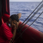 
              A migrant from Egypt rests aboard the Ocean Viking, a search and rescue ship run by NGO SOS Mediterranee and the International Federation of Red Cross (IFCR), Sunday, Aug 28, 2022 while waiting for the third day for the Italian government to allocate a port to disembark. (AP Photo/Jeremias Gonzalez).
            