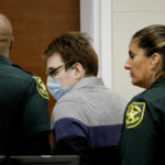 
              Marjory Stoneman Douglas High School shooter Nikolas Cruz is escorted from the courtroom during a break in the penalty phase of his trial at the Broward County Courthouse in Fort Lauderdale, Fla., Tuesday, Aug. 30, 2022. Cruz previously plead guilty to all 17 counts of premeditated murder and 17 counts of attempted murder in the 2018 shootings. (Amy Beth Bennett/South Florida Sun Sentinel via AP, Pool)
            