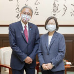
              In this photo released by the Taiwan Presidential Office, Taiwan's President Tsai Ing-wen, right, poses for photos with Keiji Furuya, an ultra-conservative who heads a Japan-Taiwan parliamentarians group, in Taipei, Taiwan on Tuesday, Aug. 23, 2022. Taiwan's president invoked an armed conflict from 1958 as an example of the island's resolve to defend itself while she met Tuesday with more foreign visitors amid the highest tensions with China in decades. (Taiwan Presidential Office via AP)
            