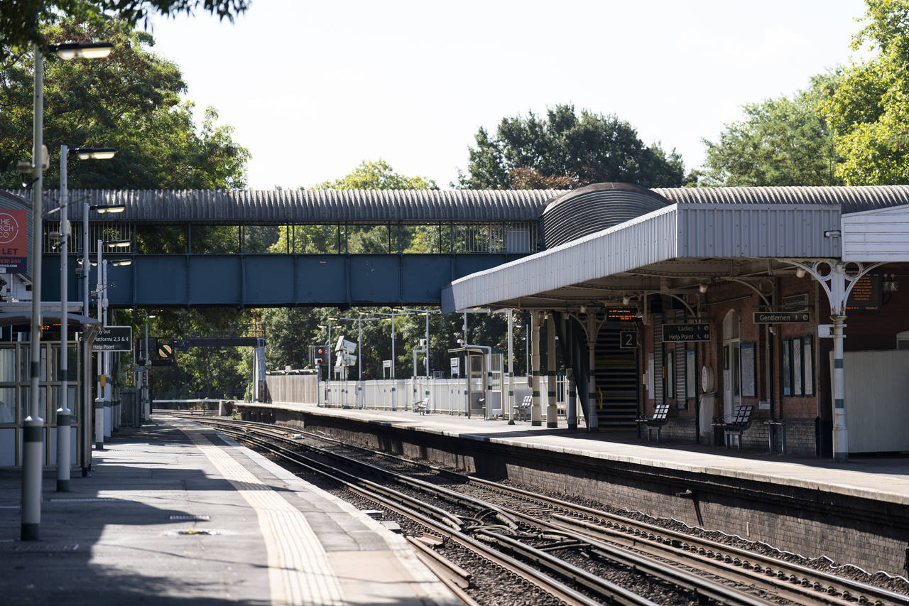 Empty platforms at Wandsworth Common Station in south London, Saturday Aug. 12, 2022. Rail services...