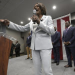 
              U.S. Rep. Val Demings, D-Fla., front, the Democratic candidate for the U.S. Senate, addresses supporters as her husband, Orange County Mayor Jerry Demings, right, watches during a primary election party on Tuesday, Aug. 23, 2022, in Orlando, Fla. (AP Photo/Phelan M. Ebenhack)
            