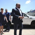 
              Alex Jones arrives at the Travis County Courthouse in Austin, Tuesday Aug. 2, 2022. The father of a 6-year-old killed in the Sandy Hook Elementary School shooting has testified that conspiracy theorist Alex Jones made his life a “living hell” by pushing claims the murders were a hoax. Neil Heslin testified Tuesday that he fears for his life because of Jones' claims. Heslin and Scarlett Lewis are the parents of 6-year-old Jesse Lewis. (Briana Sanchez/Austin American-Statesman via AP)
            