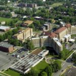 
              This aerial photo shows the Homer G. Phillips Senior Living Community, right, in the Ville neighborhood of St. Louis, that occupies the old Homer G. Phillips Hospital, May 18, 2004. A new Homer G. Phillips Memorial medical facility opened in the city and some people see the new name as an affront to the original, which is a recognized historic landmark. (Jerry Naunheim Jr./St. Louis Post-Dispatch via AP)
            