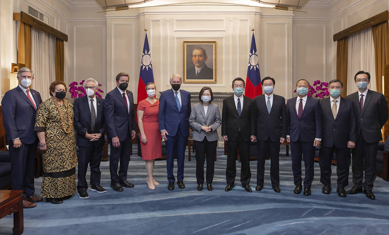 In this photo released by the Taiwan Presidential Office, Taiwan's President Tsai Ing-wen pose for ...