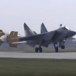 
              In this handout photo taken from video released by Russian Defense Ministry Press Service on Thursday, Aug. 18, 2022, a MiG-31 fighter jet of the Russian air force lands at the Chkalovsk air base in the Kaliningrad region. The Russian Defense Ministry said three MiG-31 fighters equipped to carry Kinzhal hypersonic missiles were deployed to the region as part of "additional measures of strategic deterrence." (Russian Defense Ministry Press Service photo via AP)
            