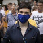 
              A protester wearing mask with EU flag attends a protest rally in downtown Sofia in front of Bulgarian Presidency building on Wednesday, Aug 10, 2022. Hundreds of Bulgarians gathered to express their fear that after the pro-Western government was toppled in June allegedly because of Sofia's hard stance against Kremlin's invasion in Ukraine and its refusal to pay Gazprom in rubles, the current caretaker government could now redraw some foreign policy lines. (AP Photo/Valentina Petrova)
            