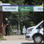 
              An officer stands outside a gate of the Chautauqua Institution in Chautauqua, N.Y., Friday, Aug. 12, 2022. Salman Rushdie, the author whose writing led to death threats from Iran in the 1980s, was attacked and apparently stabbed in the neck Friday by a man who rushed the stage as he was about to give a lecture at the Chautauqua Institution. (AP Photo/Joshua Bessex)
            