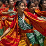 
              Tribal Bodo girls in traditional attire perform Sikhlai dance on Independence Day in Gauhati, northeastern Assam state, India, Monday, Aug. 15, 2022. The country is marking the 75th anniversary of its independence from British rule. (AP Photo/Anupam Nath)
            