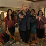
              This image released by Universal Pictures shows Jo Koy, center, in "Easter Sunday." (Ed Araquel/Universal Pictures via AP)
            
