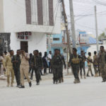 
              Soldiers patrol outside the Hayat Hotel in Mogadishu, Somalia, Saturday Aug, 20, 2022. At least 10 people were killed in an attack by Islamic militants who stormed the hotel in Somalia's capital late Friday, police and eyewitnesses said. Several other people were injured and security forces rescued many others, including children, from the scene of the attack at Mogadishu's Hayat Hotel. (AP Photo/Farah Abdi Warsameh)
            