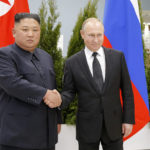 
              FILE - Russian President Vladimir Putin, right, and North Korea's leader Kim Jong Un shake hands during their meeting in Vladivostok, Russia, April 25, 2019. As the war in Ukraine stretches into its seventh month, North Korea is hinting at its interest in sending construction workers to help rebuild Russian-occupied territories in the country's east. (AP Photo/Alexander Zemlianichenko, Pool, File)
            