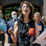 
              Diane Foley, mother of James Foley, foreground, accompanied by from left, Paula and Ed Kassig, the parents of Peter Kassig, Marsha Mueller, the mother Kayla Mueller and her sister Lori Lyon, speaks to members of the media after the sentencing of El Shafee Elsheikh at the U.S. District Courthouse in Alexandria, Va., Friday, Aug. 19, 2022. Elsheikh, who was sentenced to life in prison, was convicted on April 14, 2022 of kidnapping and murdering freelance journalist James Foley as well as participating in the detention and murders of Steven Sotloff, Kayla Mueller and Peter Kassig, all in 2014. (AP Photo/Andrew Harnik)
            