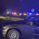 
              In this photo provided by Wake County Sheriff's Office on Twitter, is the scene of a deputy-involved incident on Battle Bridge Road, near Auburn-Knightdale Road, Thursday, Aug. 11, 2022, in Wake County, N.C. Authorities in North Carolina are trying to determine who fired the shots that killed a sheriff's deputy along a dark road late Thursday night. Sheriff’s spokesman Eric Curry says it happened on a dark section of road adjacent to open land about a quarter mile from a gas station. (Wake County Sheriff's Office via AP)
            