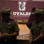 
              Texas Department of Safety Troopers stand by for a meeting of the Board of Trustees of Uvalde Consolidated Independent School District, Wednesday, Aug. 24, 2022, in Uvalde, Texas. The board is expected to hold termination hearings to decide the employment fate of Uvalde School District Police Chief Pete Arredondo. (AP Photo/Eric Gay)
            