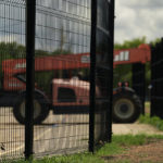 
              New fencing is constructed around Benson Elementary School, Thursday, Aug. 25, 2022, in Uvalde, Texas. Following the shootings at Robb Elementary, new fencing is being installed on all campuses. (AP Photo/Eric Gay)
            