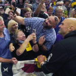 
              Pennsylvania Lt. Gov. John Fetterman, the Democratic nominee for the state's U.S. Senate seat, right, poses for a photo with a supporter after speaking at a rally in Erie, Pa., on Friday, Aug. 12, 2022. (AP Photo/Gene J. Puskar)
            