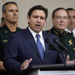 
              Florida Gov. Ron DeSantis gestures as he speaks during a news conference Thursday, Aug. 4, 2022, in Tampa, Fla. DeSantis announced that he was suspending State Attorney Andrew Warren, of the 13th Judicial Circuit, due to "neglect of duty." (AP Photo/Chris O'Meara)
            