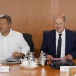 
              German Chancellor Olaf Scholz, right, and German Economy and Climate Minister Robert Habeck, right, attend the weekly cabinet meeting of the German Government at the chancellery in Berlin, Germany, Wednesday, Aug. 24, 2022. (AP Photo/Markus Schreiber)
            