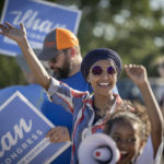 
              U.S. Rep. Ilhan Omar waves to passersby for support during a voter engagement event on the corner of Broadway and Central Avenues in Minneapolis, on Tuesday, Aug. 9, 2022. Omar faces a primary challenge from former city council member Don Samuels. (Elizabeth Flores/Star Tribune via AP)
            