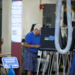 
              A voter casting his vote during the Florida primary election at the Miami Beach Fire Department - Station 3 on Tuesday, Aug. 23, 2022 in Miami Beach, Fla. (David Santiago /Miami Herald via AP)
            