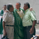 
              FILE - Monsignor Silvio Baez, center, auxiliary bishop of the Archdiocese of Managua, embraces members of the National Elderly Union, in the Metropolitan Cathedral in Managua, Nicaragua, June 23, 2013. Baez left the country in 2019 at the Vatican’s request, a transfer that was lamented by the opposition and celebrated by the ruling Sandinistas. (AP Photo/Esteban Felix, File)
            