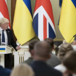 
              Ukrainian President Volodymyr Zelenskyy, right, and Britain's Prime Minister Boris Johnson attend a news conference in Kyiv, Ukraine, Wednesday, Aug. 24, 2022. British prime minister Boris Johnson urged western allies to maintain their strong support to Ukraine through the winter arguing that their position would improve after the cold weather ends. (AP Photo/Andrew Kravchenko)
            