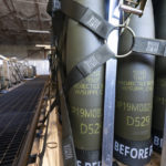 
              FILE - Pallets of 155 mm shells ultimately bound for Ukraine are loaded by the 436th Aerial Port Squadron, Friday, April 29, 2022, at Dover Air Force Base, Del. President Joe Biden asked Congress on Thursday for $33 billion to bolster Ukraine's fight against Russia, signaling a burgeoning and long-haul American commitment. The Biden administration has announced another $1 billion in new military aid for Ukraine. The Aug. 8 pledge promises what will be the biggest yet delivery of rockets, ammunition and other arms straight from Department of Defense stocks for Ukrainian forces. (AP Photo/Alex Brandon, File)
            
