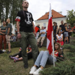 
              Supporters of the far-right organization National-Radical Camp, ONR, take part in the commemoration of the 1944 Warsaw Uprising, in Warsaw, Poland, Monday Aug. 1, 2022. Poles are marking the 78th anniversary of the Warsaw Uprising, a doomed revolt against Nazi German forces during World War II. (AP Photo/Michal Dyjuk)
            